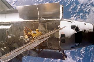 The nose and payload bay of the Orbiter Endeavour, viewed from the Mir Space Station while the two spacecrafts are docked for NASA-6. 